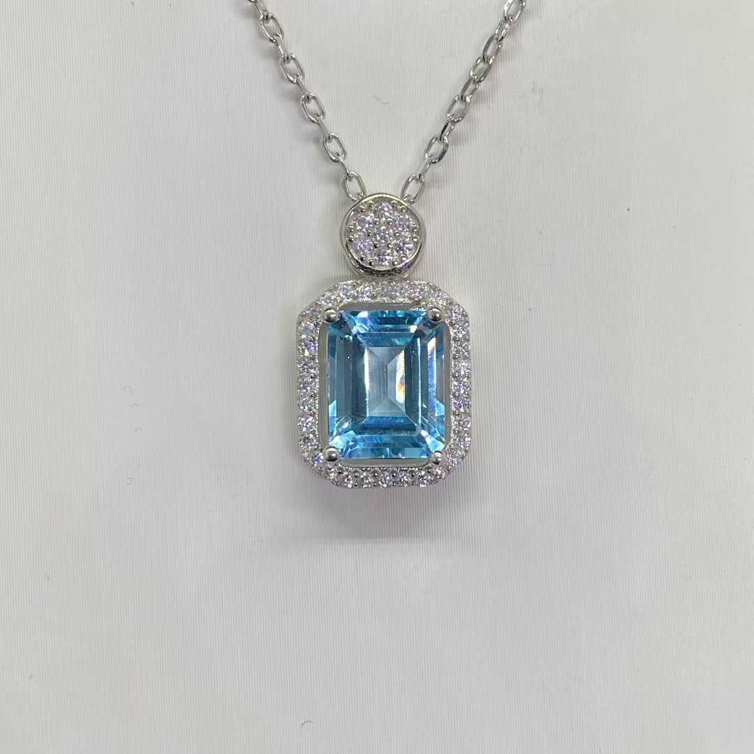 Natural Blue Topaz Halo Necklace in 925 Sterling Silver, 7×9mm Emerald-Cut Gemstone