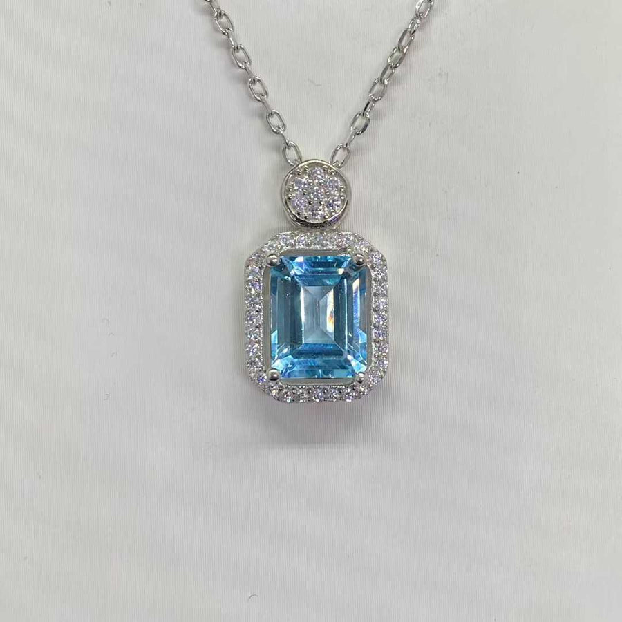 Natural Blue Topaz Halo Necklace in 925 Sterling Silver, 7×9mm Emerald-Cut Gemstone