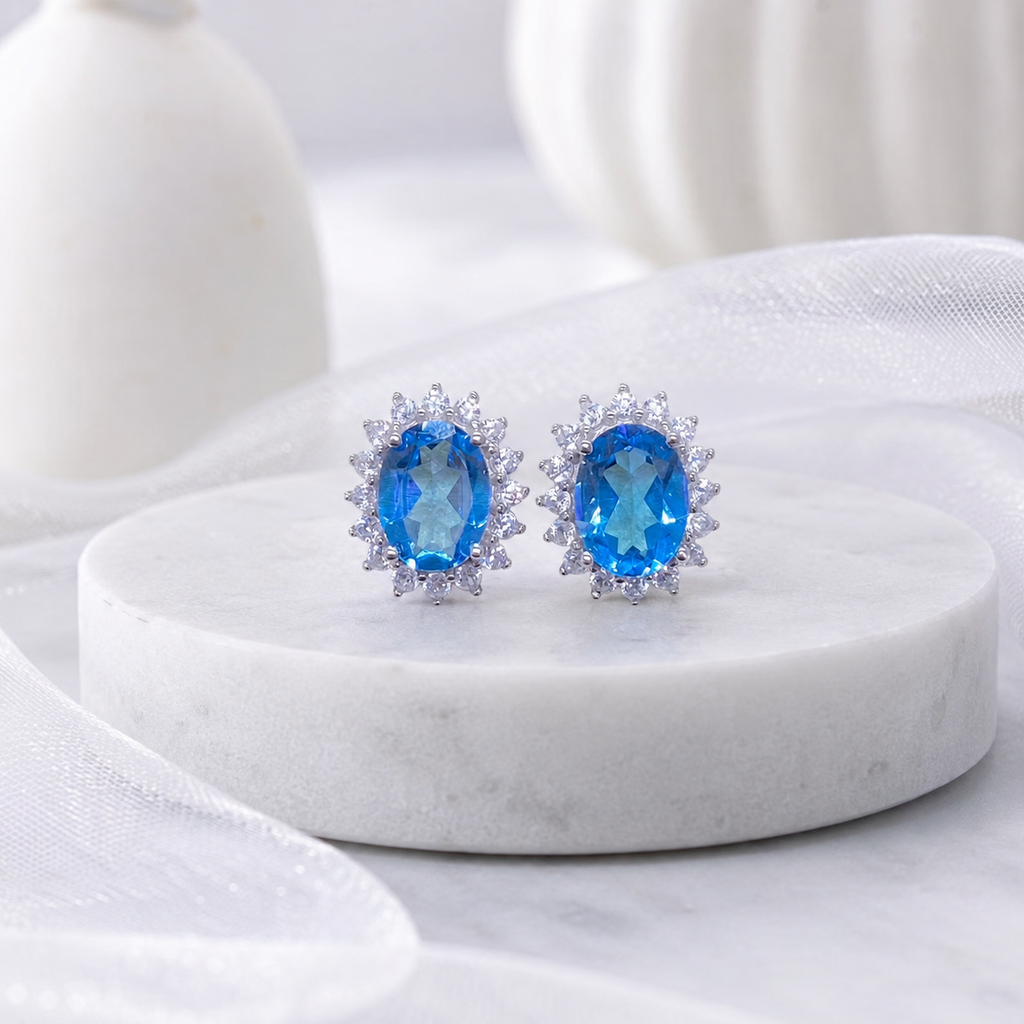 Natural Blue Topaz Halo Stud Earrings in 925 Sterling Silver, 6×8mm Oval Gemstones