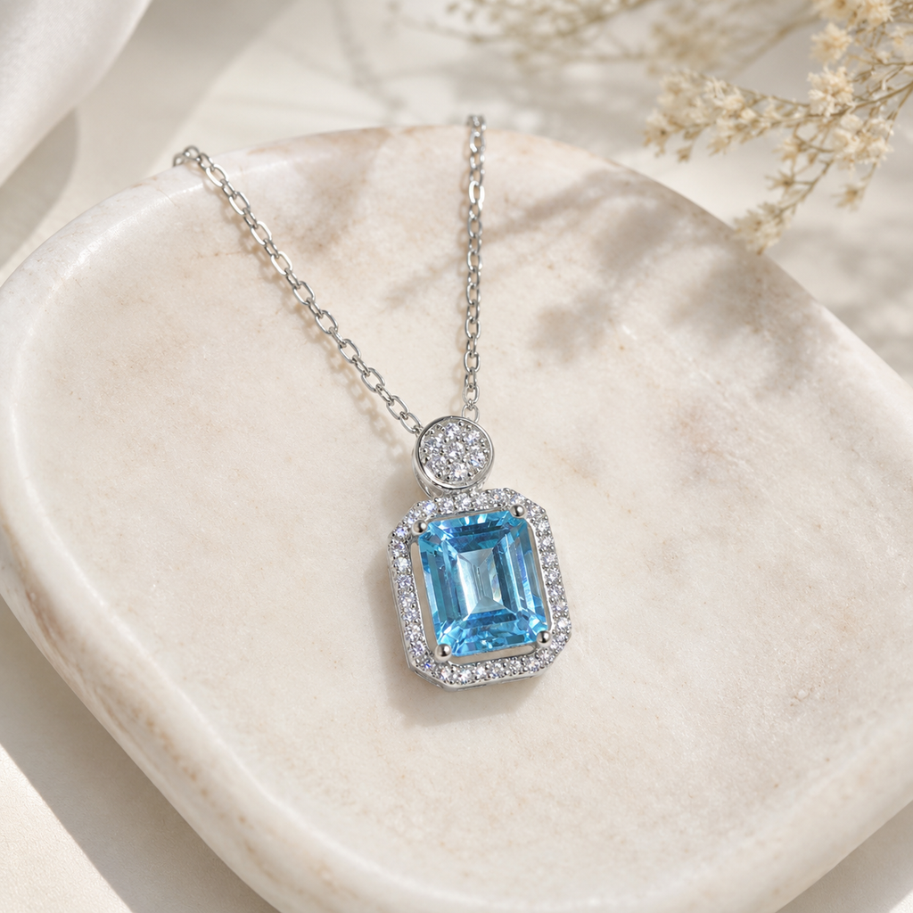 Natural Blue Topaz Halo Necklace in 925 Sterling Silver, 7×9mm Emerald-Cut Gemstone